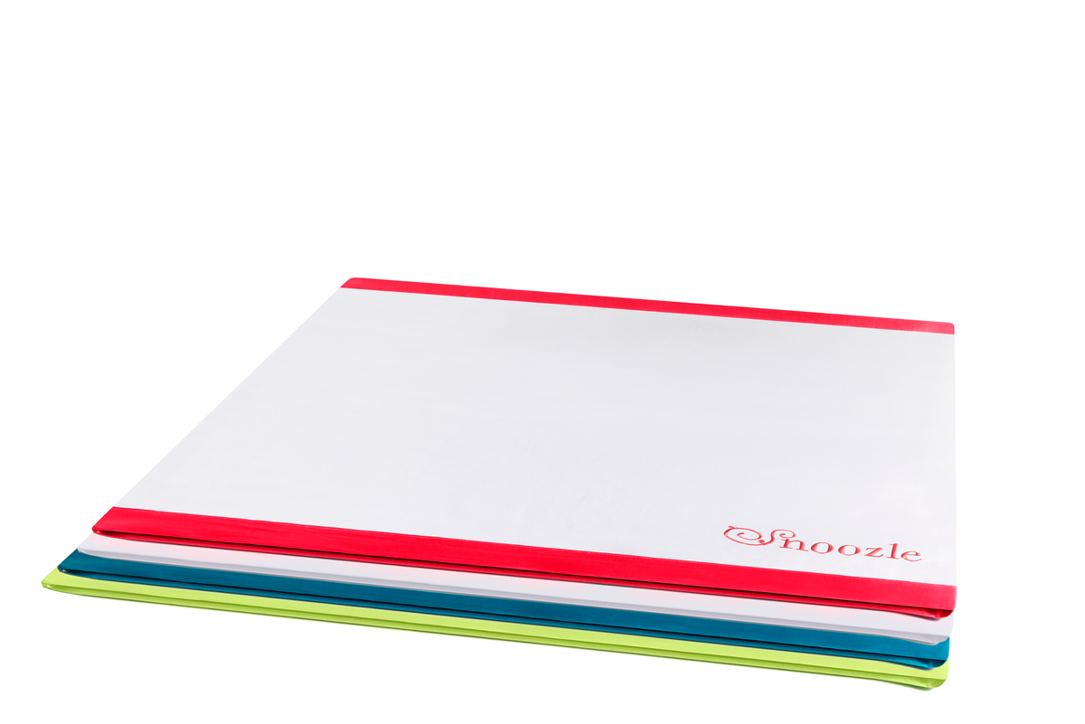 Snoozle slide sheets with red, white, blue and lime trim